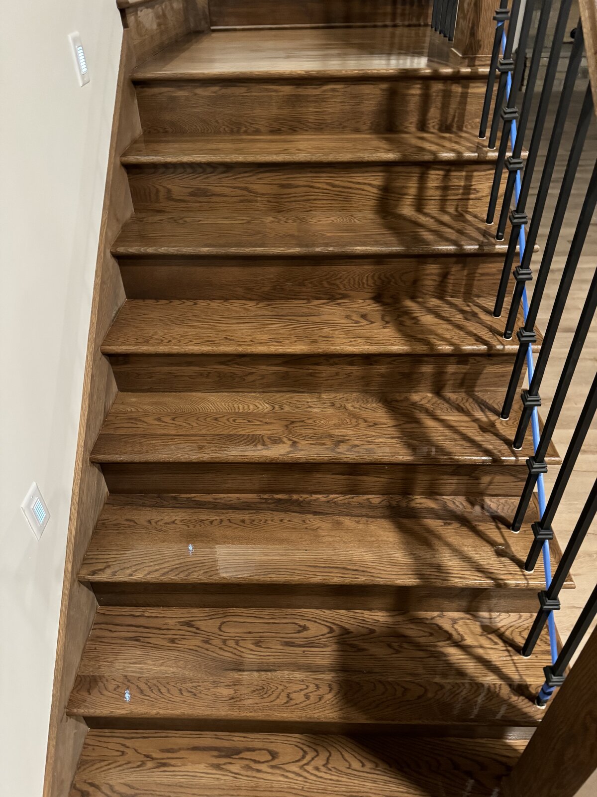 Brandon and BJ of BBJ Hardwood Flooring performing a precise hardwood installation in Wisconsin